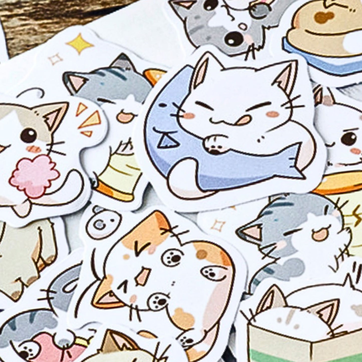 Collection of cute cat-themed stickers on a white background