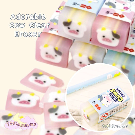 Collection of cute cow-shaped rubber erasers in pink and blue packaging with adorable cow faces