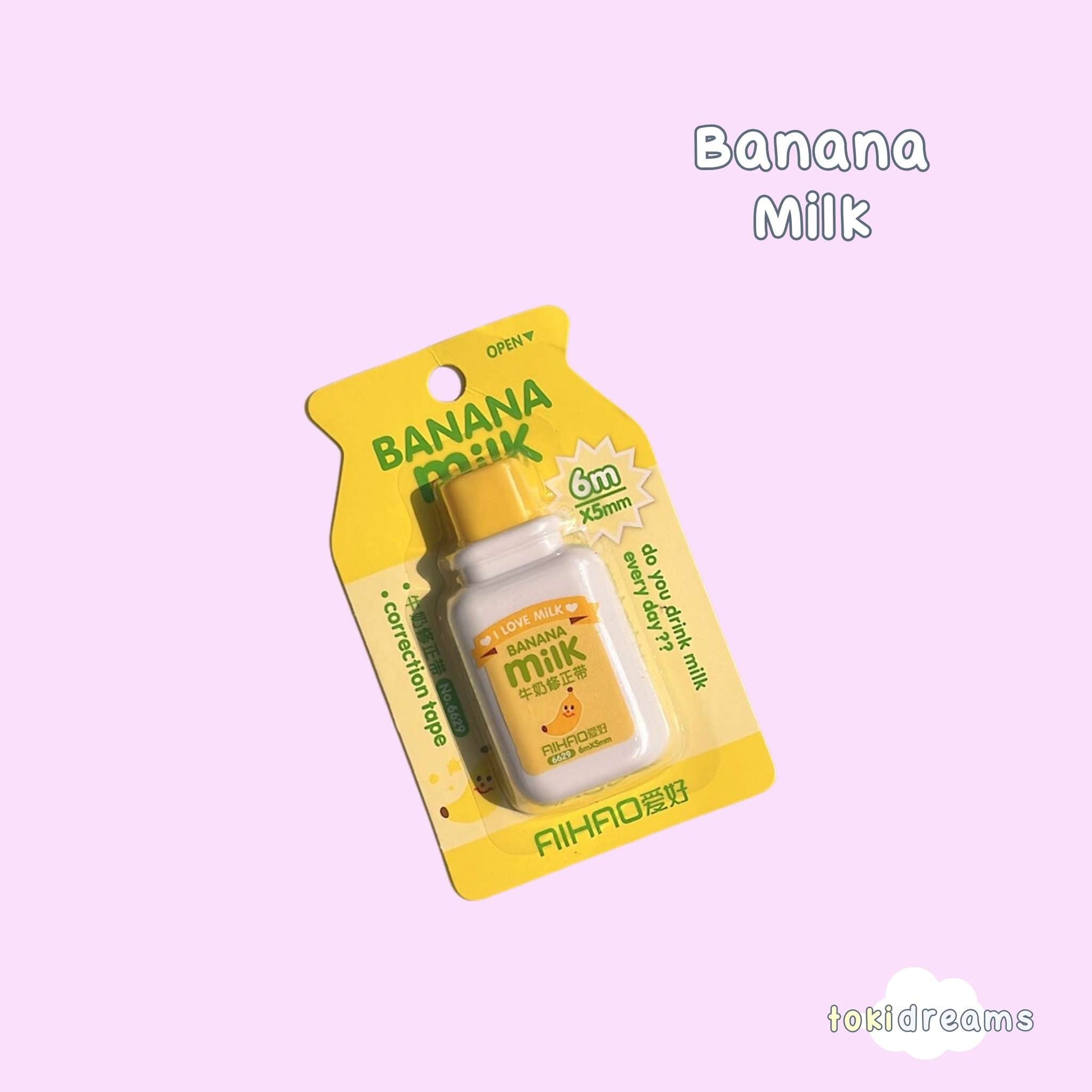 Correction tape in banana milk bottle packaging showing 6m size on purple background