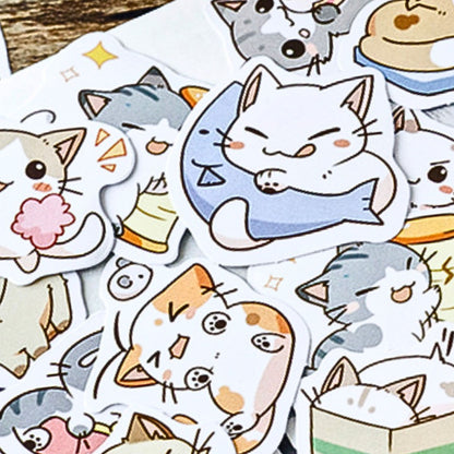 Collection of cute cat-themed stickers on a white background