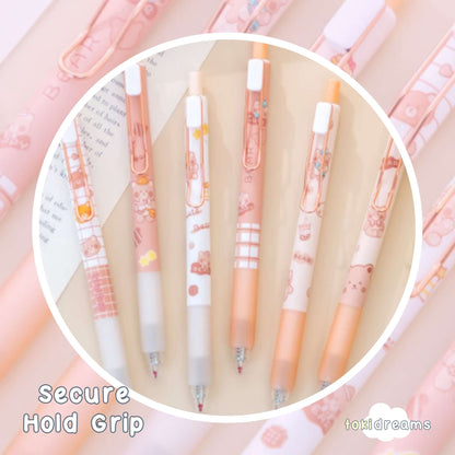 Multicolor ballpoint pens with cute bear designs and checkered grip pattern