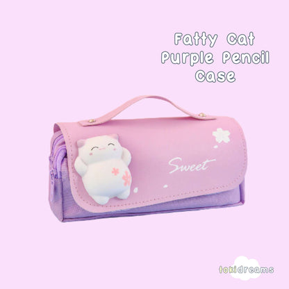 A purple fidget pencil case with a cartoon image of a fat cat on the front, and the word 'sweet' written above it. The case is closed with a snap and has a transparent window showing the expandable compartment inside.
