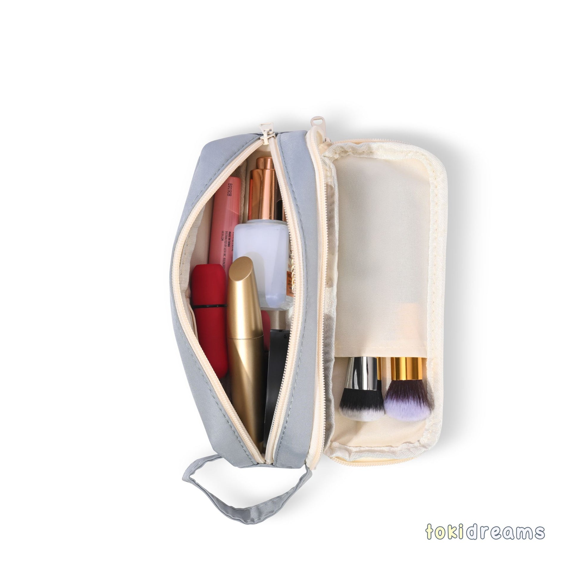 Light blue small accessory bag with cosmetic items