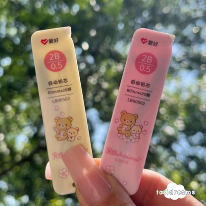 Two tubes of Mechanical Lead Refill in pink and yellow case colors, each with a cute bear design on the packaging.