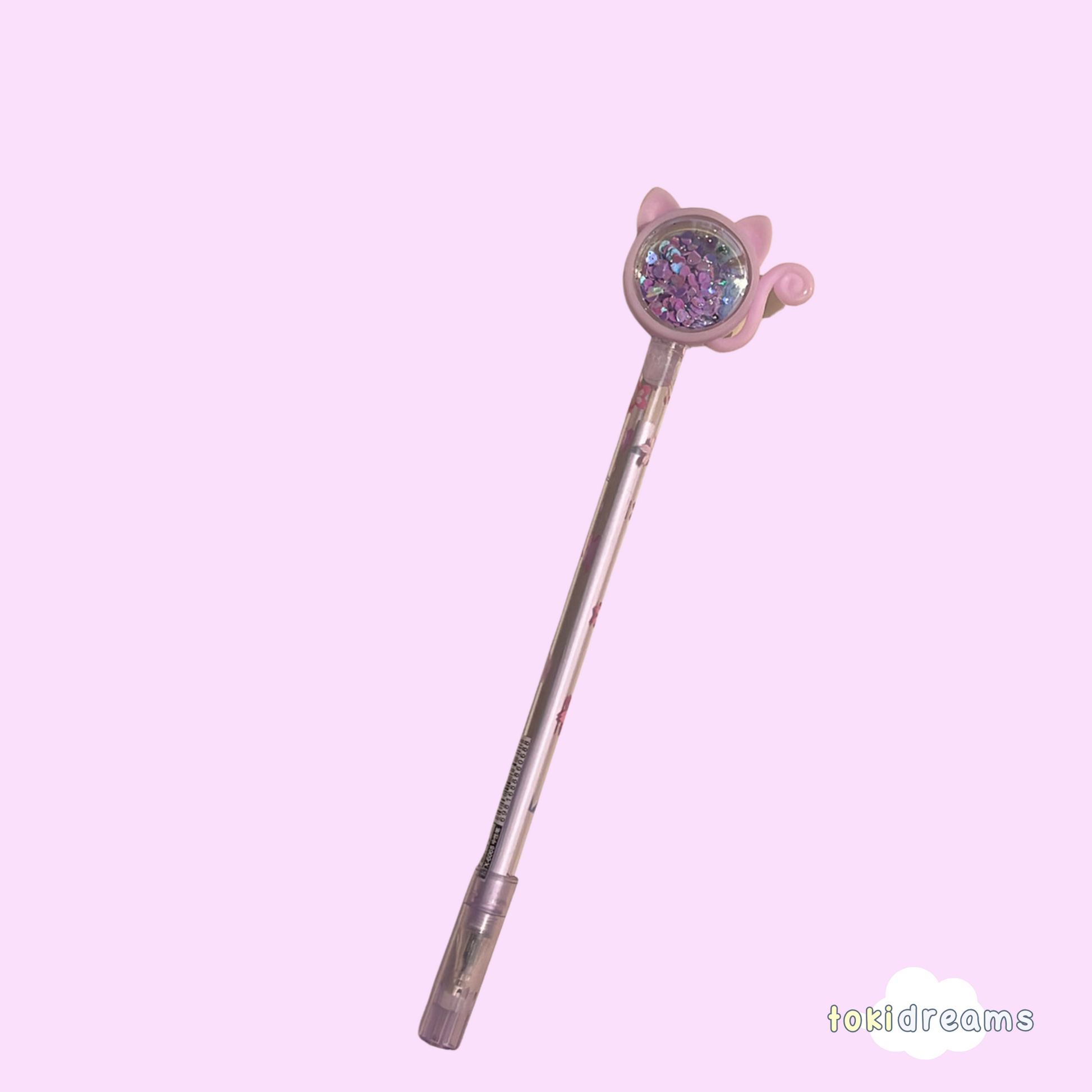 Purple sparkle gel pen with chibi cat ears and swirling glitter dome