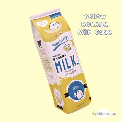 A yellow pencil pouch with milk carton shape and smiling cartoon and banana design